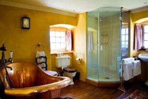 Copper roll top bath in Erskine suite bathroom