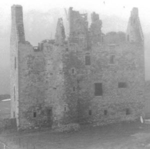 Historic photo of ruined castle in black and white