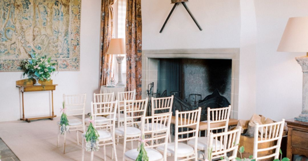 Wedding set up in great hall with large fireplace